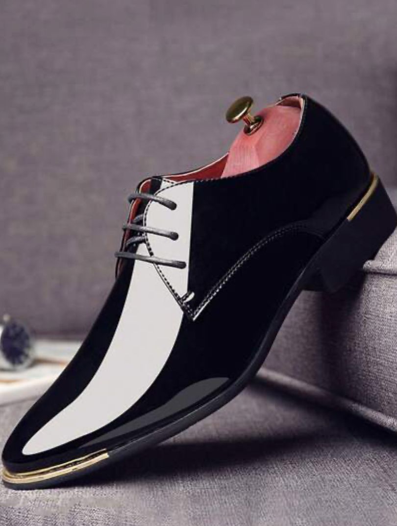 Chaussures de ville bicolores noir et blanc vernies